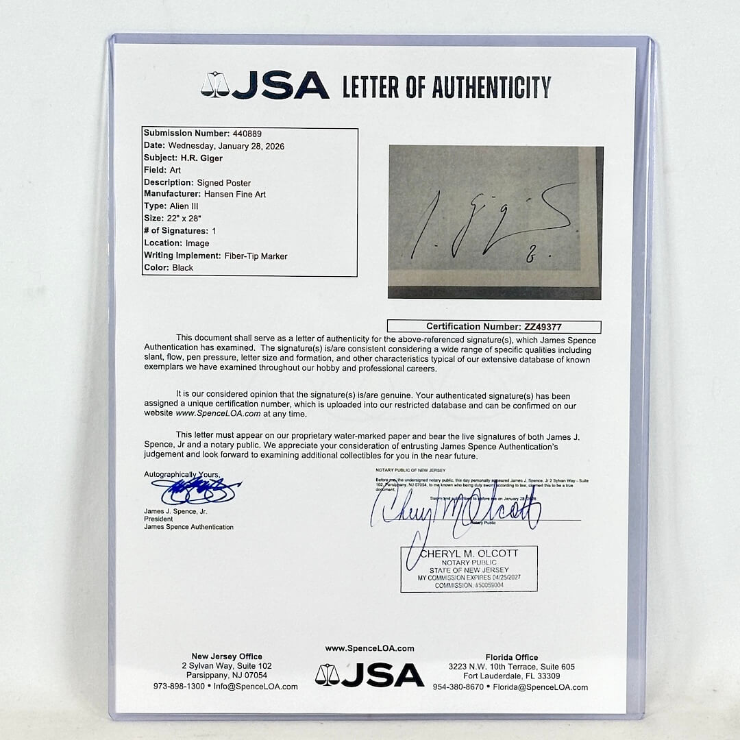 JSA letter of authenticity with a signature on a gray background