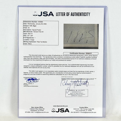 JSA letter of authenticity with a signature on a gray background