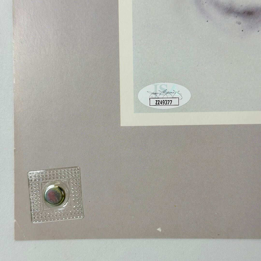 Bottom left corner of poster with slight edge wear and authentication sticker. 