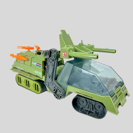 Toy military vehicle with green and gray colors on a white background