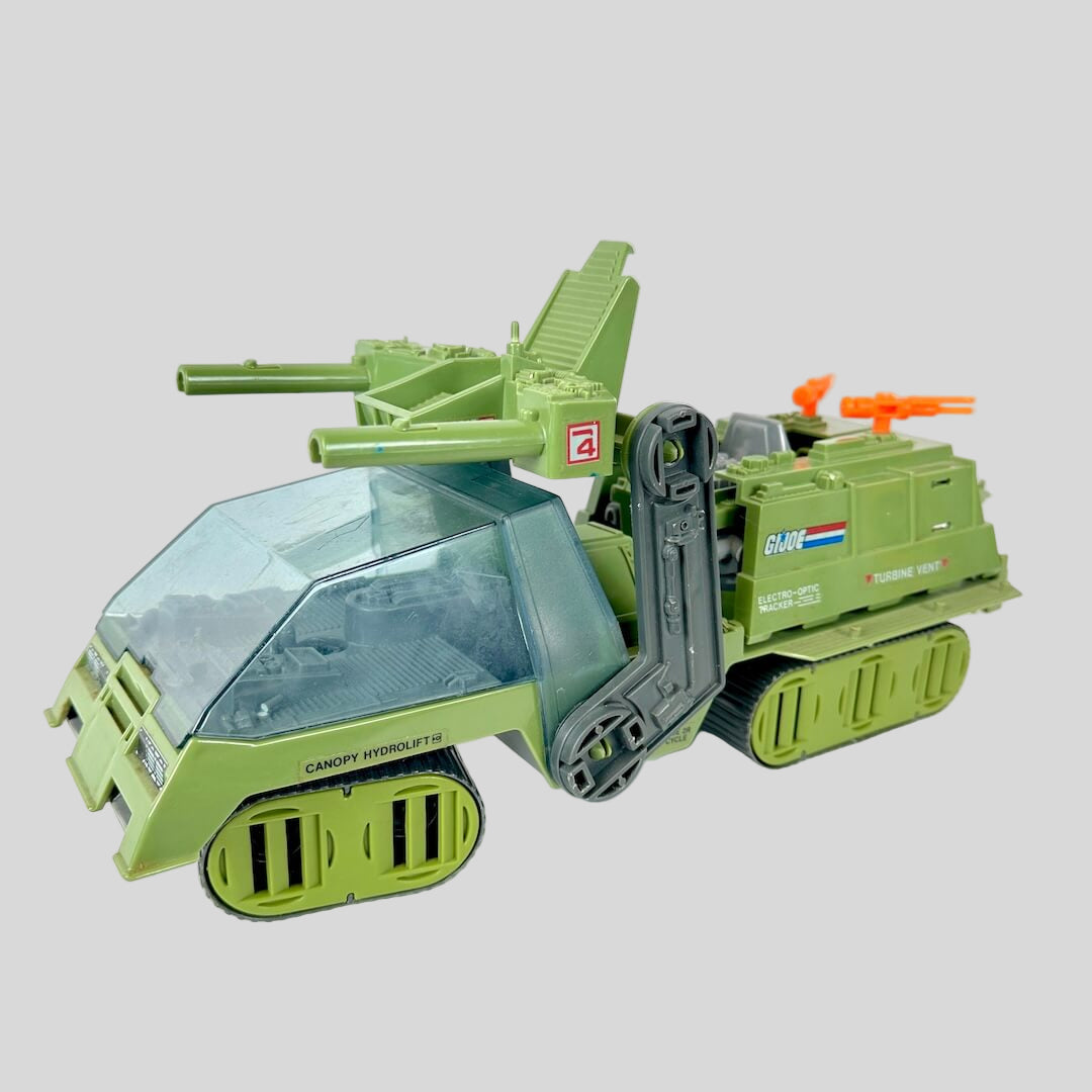 Toy tank model with green and clear sections on a white background