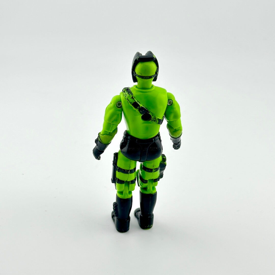 Green and black action figure on a white background