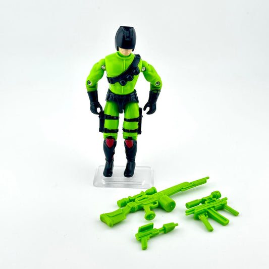 Toy figure in green and black with accessories on a white background