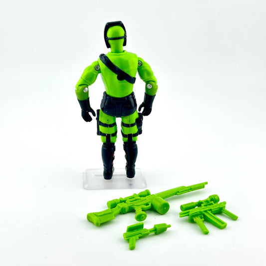 Toy figure in green and black with accessories on a white background