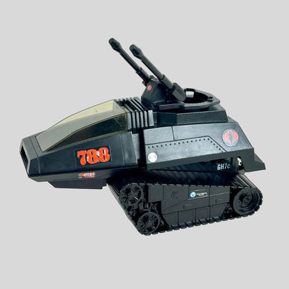 A black toy tank vehicle with red '788' markings and a circular red logo on the side, photographed on a plain background.
