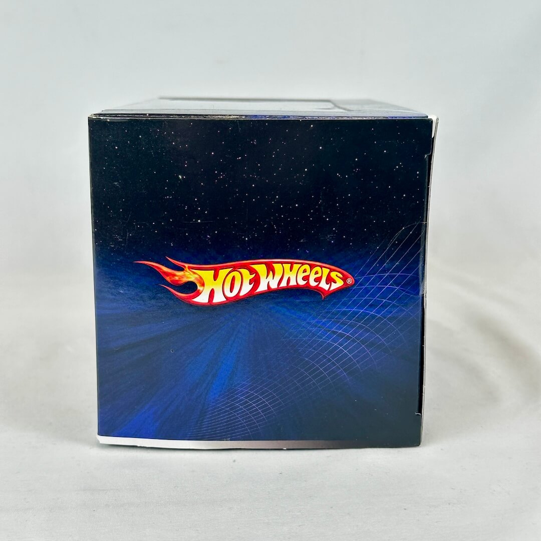 Hot Wheels packaging with a blue and black design and red logo.