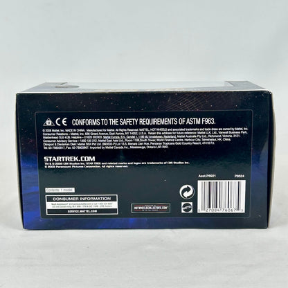 Back of a Star Trek toy box with branding and product information on a gray background
