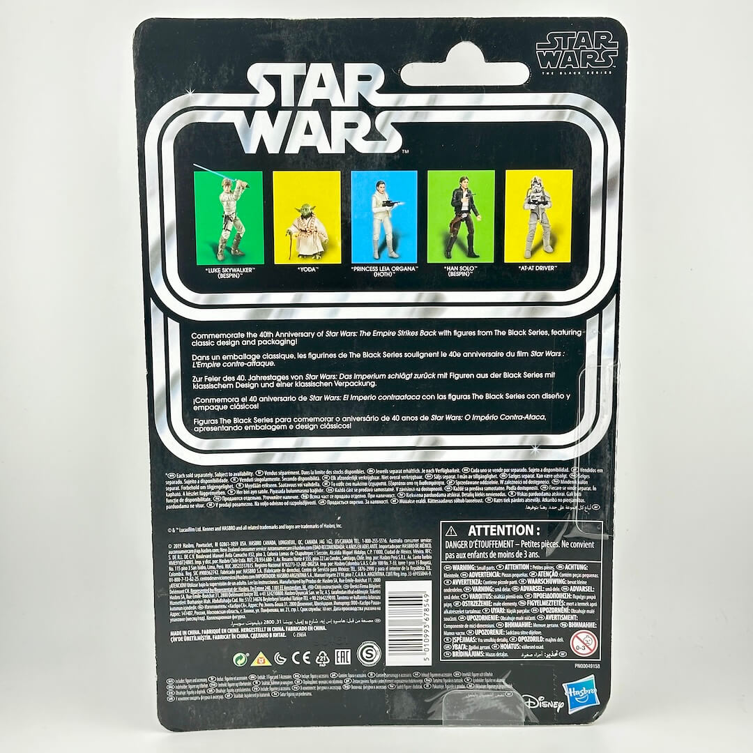 Back of Star Wars action figure packaging showing back panel with other figure images and product information. 
