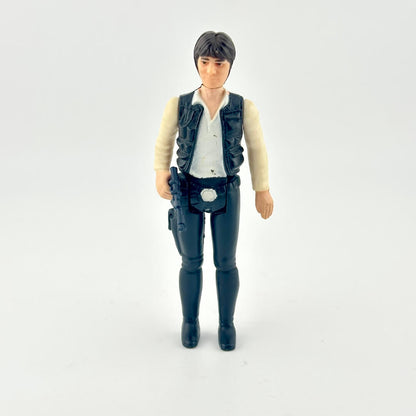 Action figure wearing a vest and pants on a white background