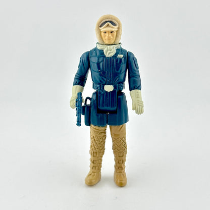 Action figure in a blue and beige outfit with a white background