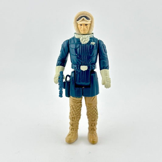 Action figure in a blue and beige outfit with a white background