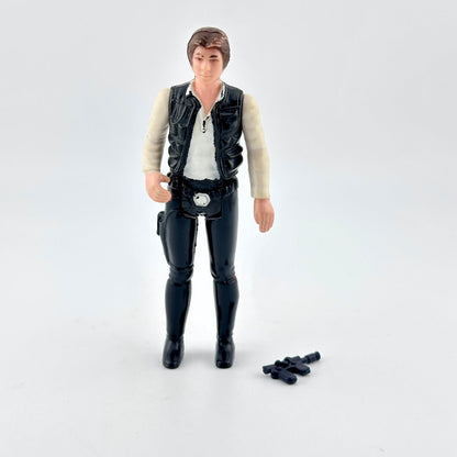 Action figure of a character in a black vest and pants on a white background
