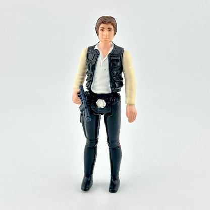 Action figure in a vest and pants on a white background