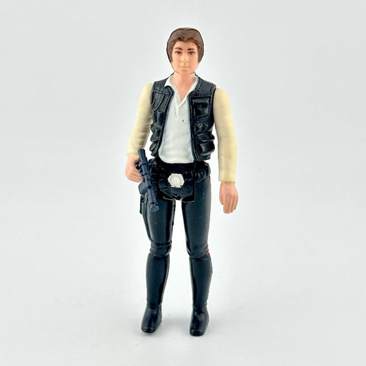 Action figure in a vest and pants on a white background