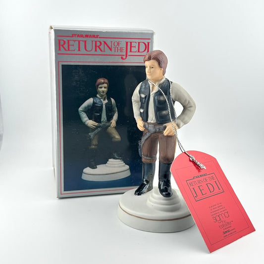 Han Solo figurine from 'Star Wars: Return of the Jedi' with packaging and tag on a white background