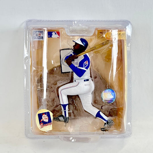 Baseball player action figure in packaging with Braves logo