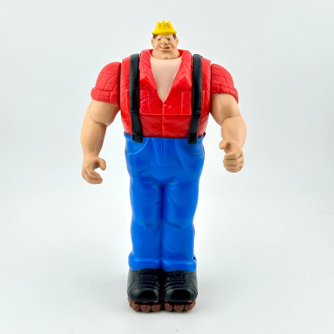 Action figure in red shirt and blue pants with a yellow hat on a white background