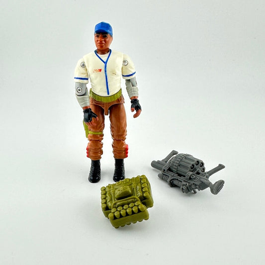 G.I. Joe action figure with accessories against white background. 