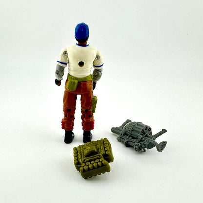 G.I. Joe action figure with accessories against gray background.