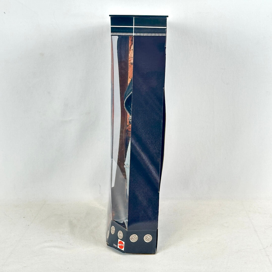 Tall, narrow box with a clear front on a white background