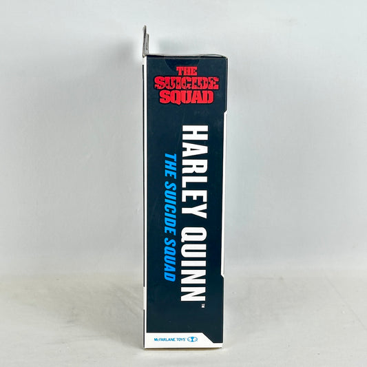 Side view of action figure packaging with details of figure inside. 