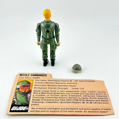 GI Joe action figure with character card and accessories against white background. 