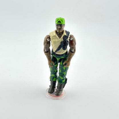 Action figure in military attire with a green cap on a white background