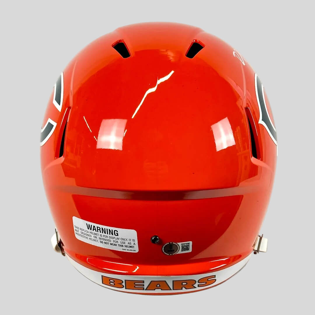 Orange helmet with 'BEARS' branding on a white background