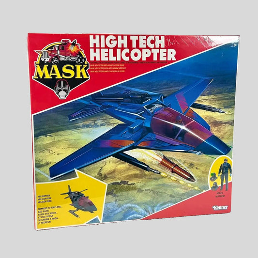 Toy packaging with "MASK" branding against gray background. 