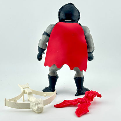 Toy figure with a red cape and accessories on a white background