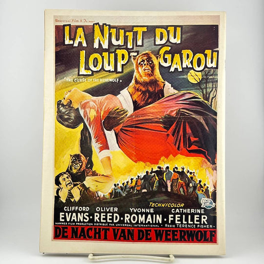 Back cover of magazine with ad for French horror movie with image of monster carrying a woman.