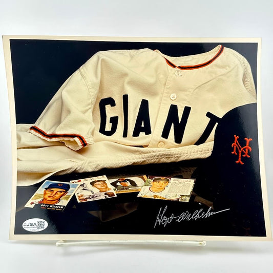 Framed photo of vintage baseball jersey with 'GIANT' text and a cap, featuring a signature and JSA logo.