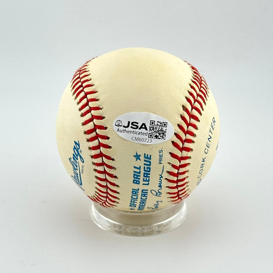 Baseball with JSA authentication label on a white background