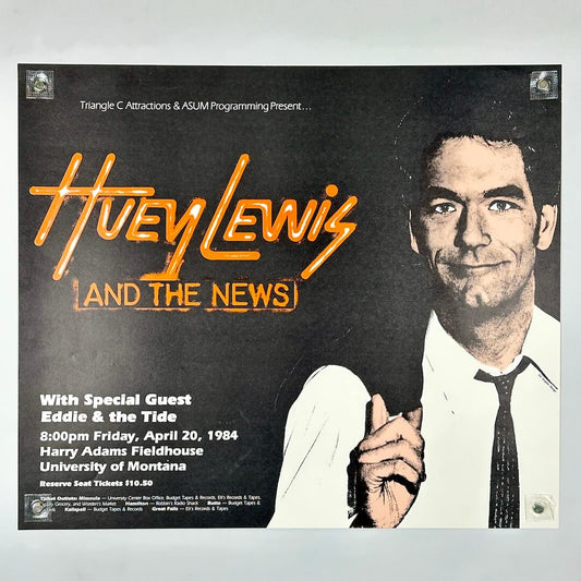 Promotional poster for Huey Lewis and the News concert featuring a smiling man in a suit.