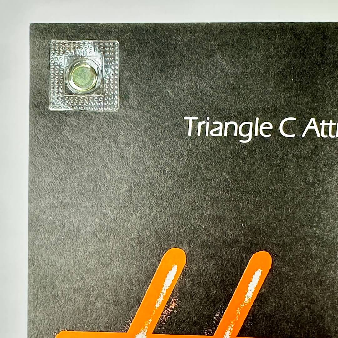 Top left corner of poster with clean edges and crisp corner. 