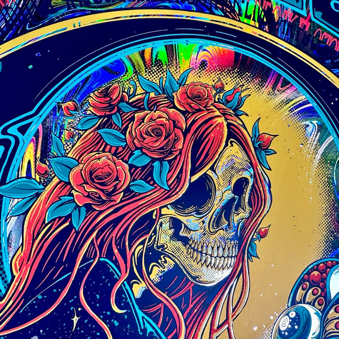 Skeleton woman with red hair and roses in her hair. moon background with rainbow foil swirl around it. 