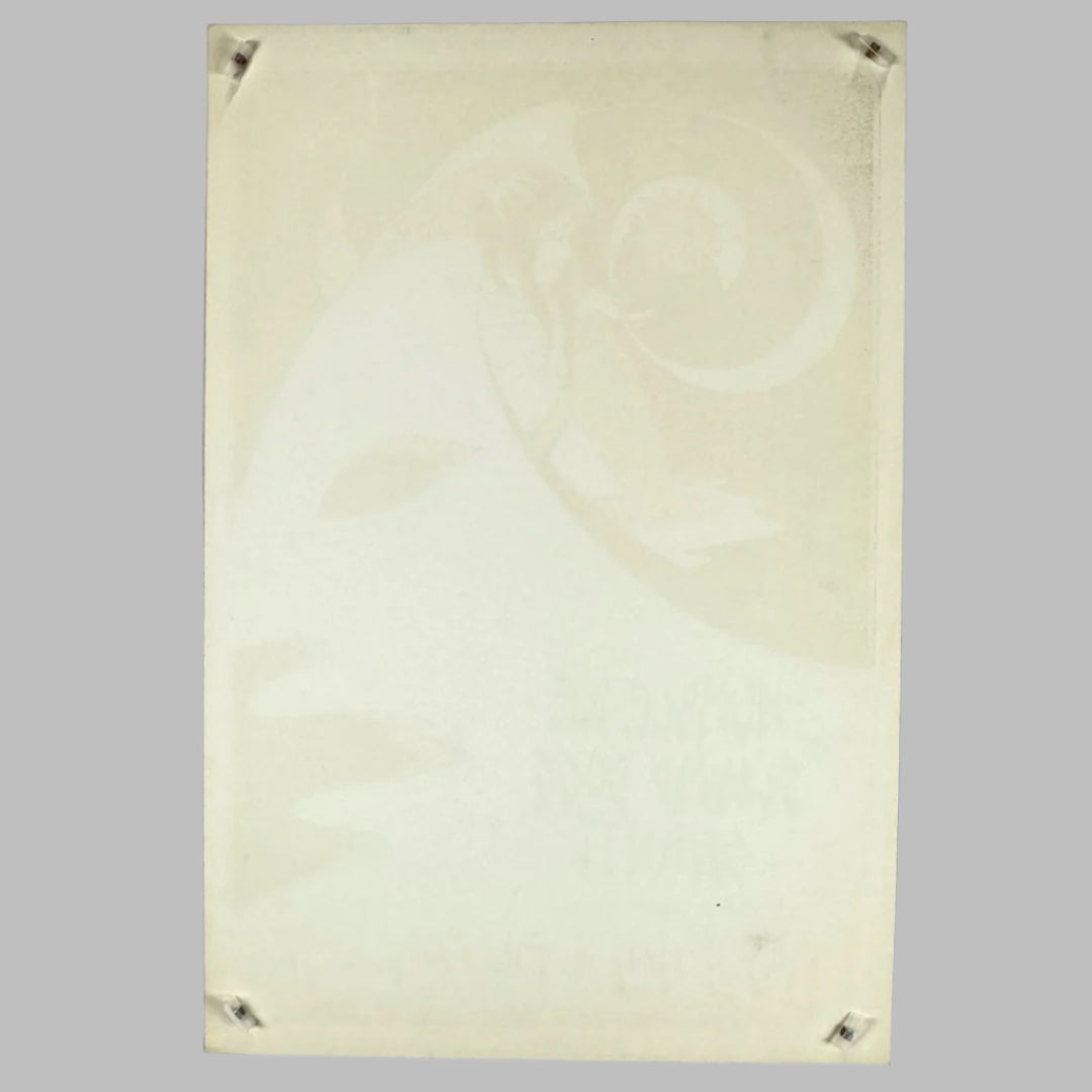 Reverse of poster showing beige color and ghost design through back, showing printing quality. 