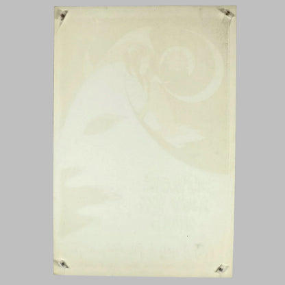 Reverse of poster showing beige color and ghost design through back, showing printing quality. 