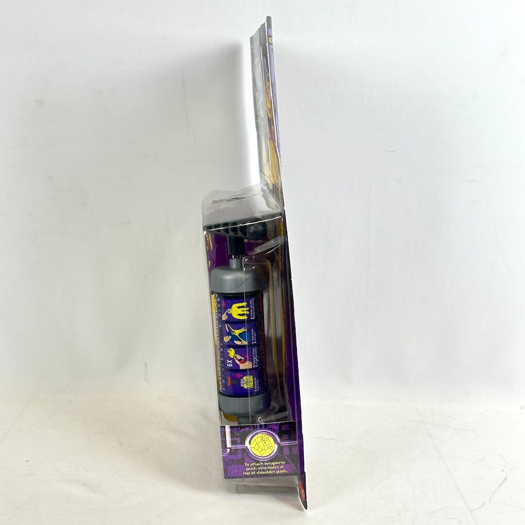 toy figure in clear packaging on a white background