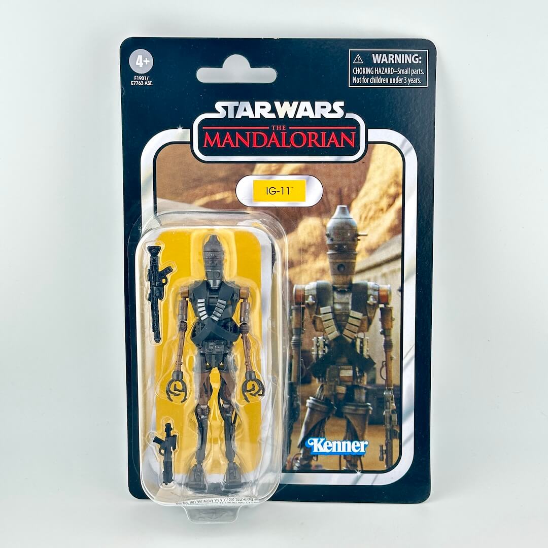 Star Wars The Mandalorian IG-11 6-inch action figure in its original packaging, featuring a black and gray droid.