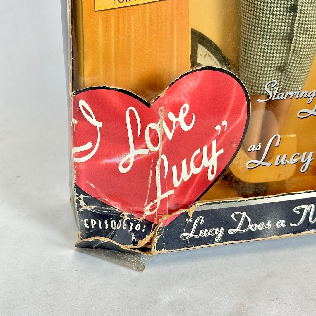 Vintage 'I Love Lucy' packaging with a red heart and character figure.