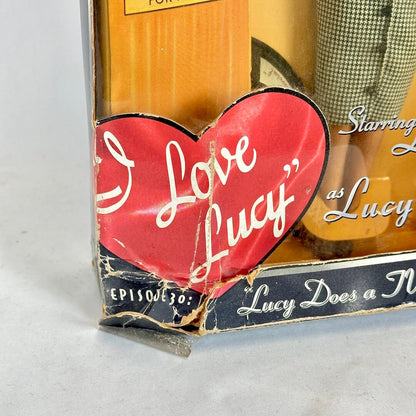 Vintage 'I Love Lucy' packaging with a red heart and character figure.
