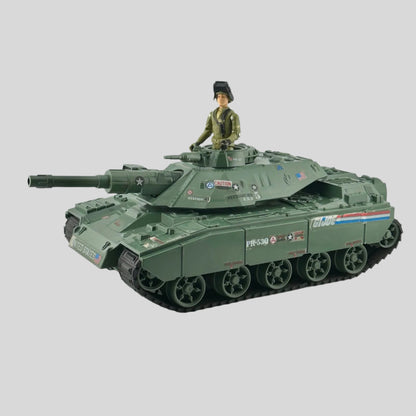 Army green tank with G.I. Joe stickers along the side with helmeted driver. 