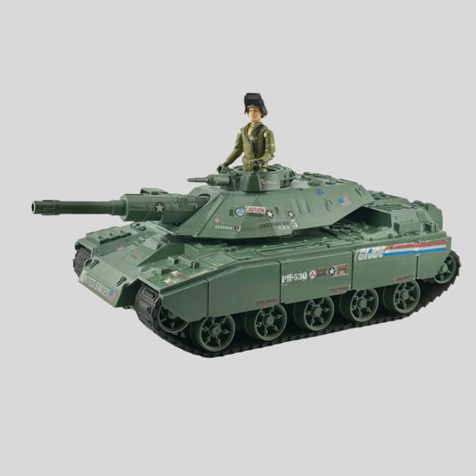 Army green tank with G.I. Joe stickers along the side with helmeted driver. 