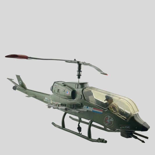 Army green helicopter with G.I Joe stickers along the side, contains action figure driver with hat & glasses. 