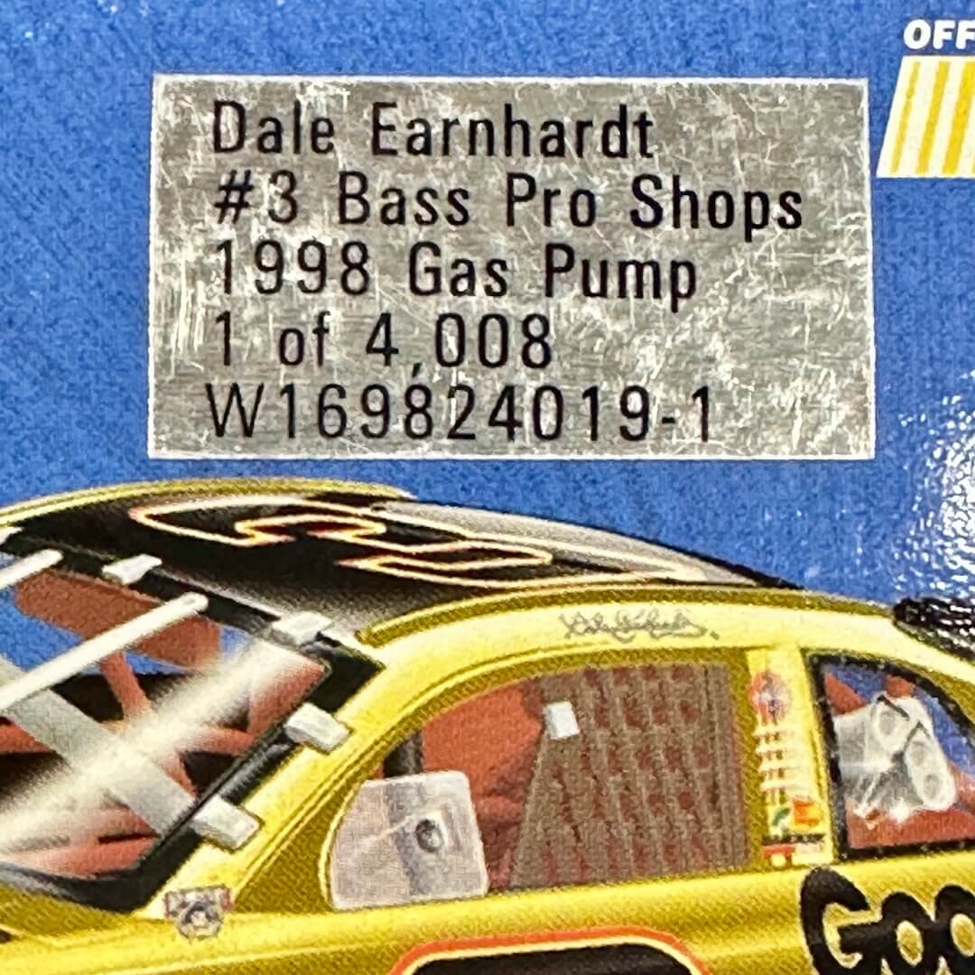 Model of a Dale Earnhardt #3 Bass Pro Shops 1998 gas pump with a label on a blue background