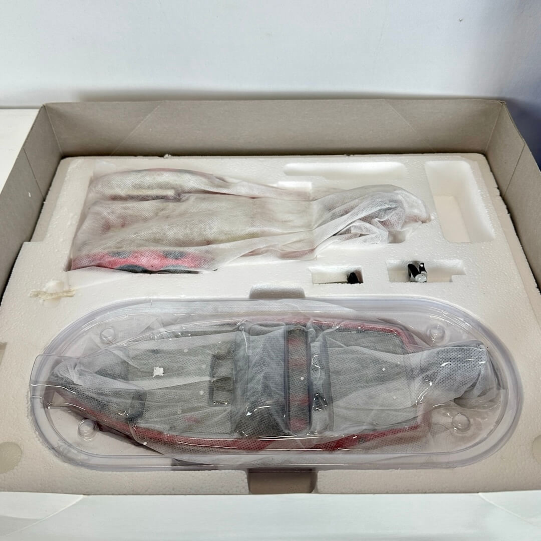 Image of box contents with original packaging. 