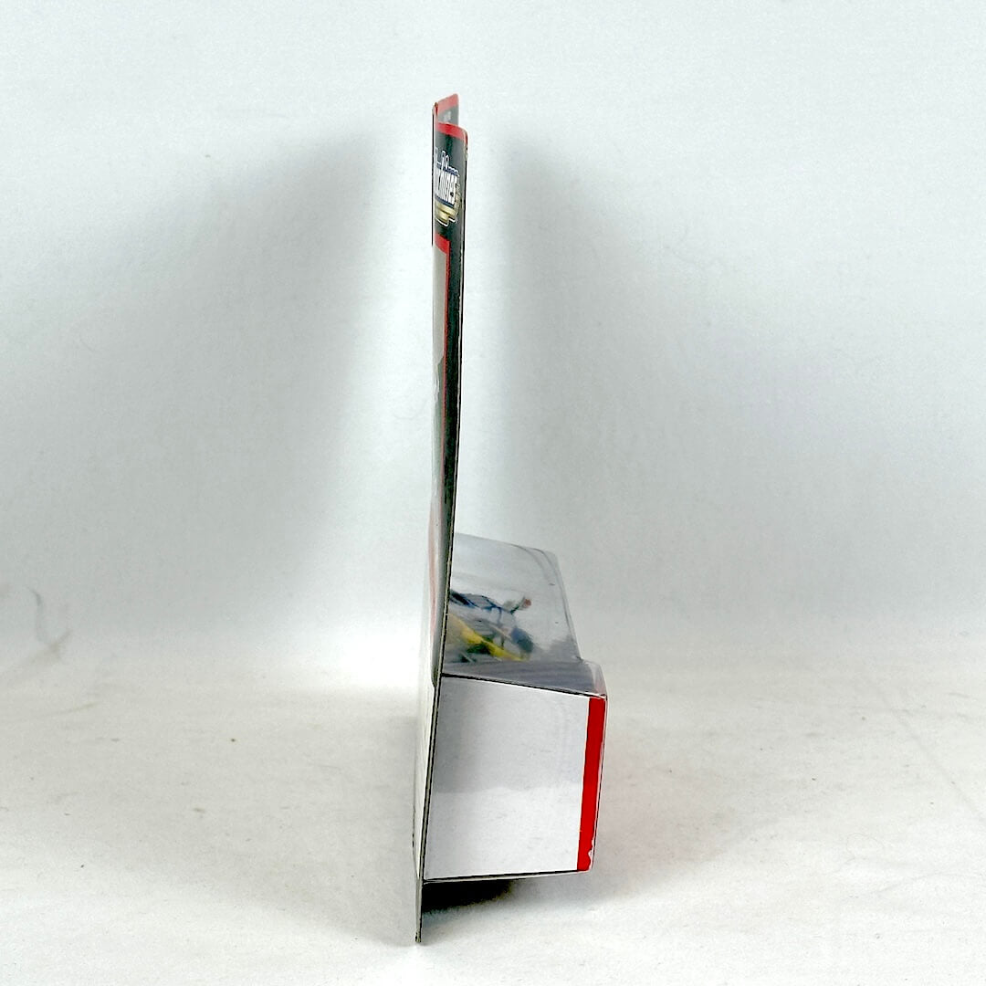 Side view of toy vehicles in packaging against white background. 