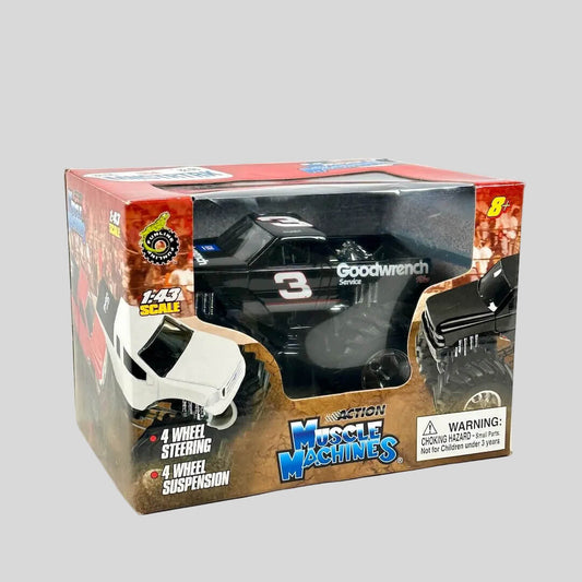 Boxed toy car with 'Action Muscle Machines' branding on a white background
