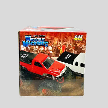 Boxed toy truck with "Muscle Machines" branding against white background. 